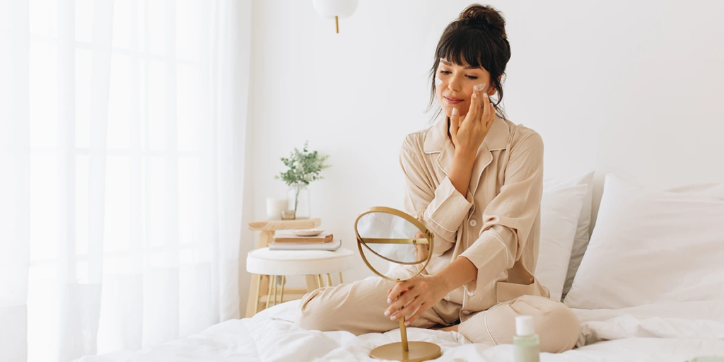 Person sitting peacefully with eyes closed in a calm environment